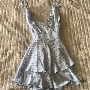 Never been worn it looks like a dress but it's a romper